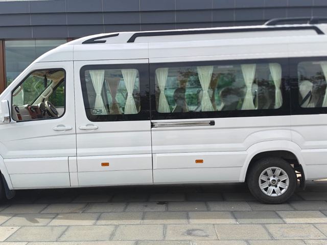 16 seater Luxury Urbania – side profile